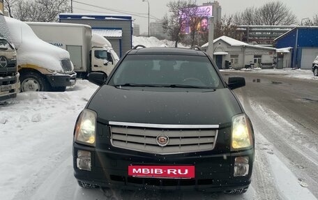 Cadillac SRX II рестайлинг, 2009 год, 875 000 рублей, 3 фотография