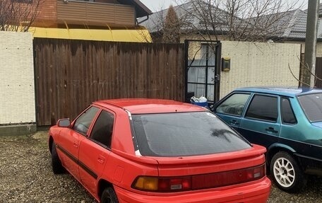 Mazda 323, 1991 год, 180 000 рублей, 16 фотография