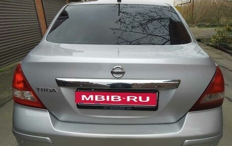 Nissan Tiida, 2010 год, 910 000 рублей, 8 фотография