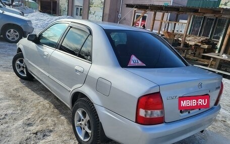 Mazda Familia, 1999 год, 315 000 рублей, 25 фотография