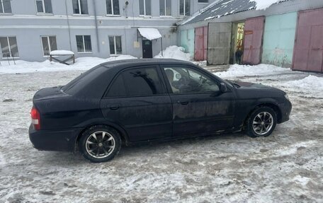 Mazda Protege, 2001 год, 325 000 рублей, 3 фотография