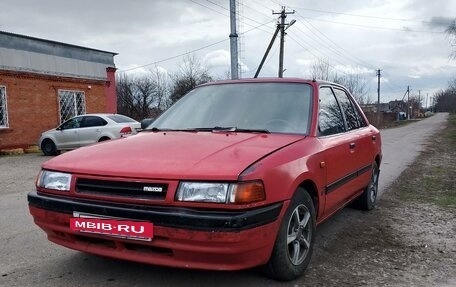 Mazda 323, 1994 год, 150 000 рублей, 5 фотография