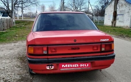 Mazda 323, 1994 год, 150 000 рублей, 2 фотография