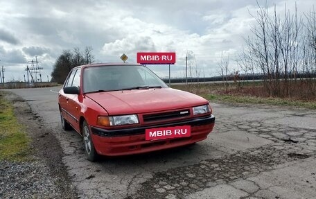 Mazda 323, 1994 год, 150 000 рублей, 6 фотография