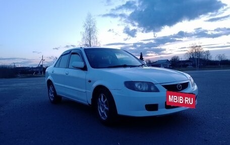 Mazda Familia, 2001 год, 400 000 рублей, 5 фотография