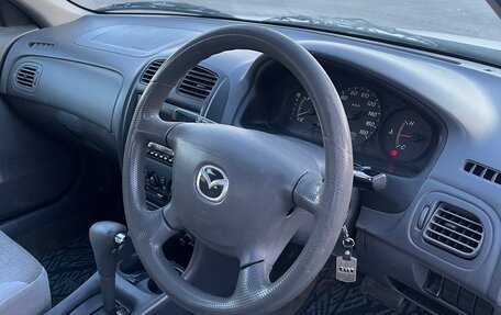 Mazda Familia, 2000 год, 405 000 рублей, 31 фотография