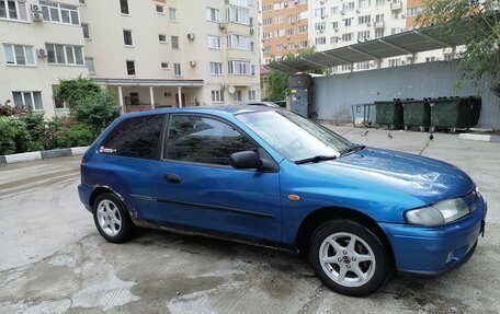 Mazda 323, 1997 год, 230 000 рублей, 4 фотография