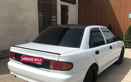 Mitsubishi Lancer VII, 1994 год, 250 000 рублей, 3 фотография