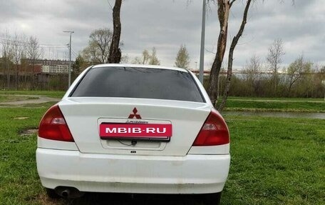 Mitsubishi Mirage VI рестайлинг, 1998 год, 250 000 рублей, 3 фотография