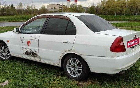 Mitsubishi Mirage VI рестайлинг, 1998 год, 250 000 рублей, 2 фотография