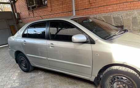 Toyota Corolla, 2004 год, 700 000 рублей, 2 фотография