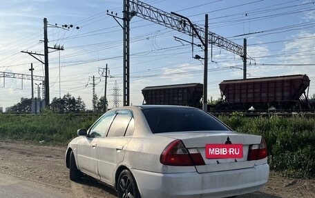 Mitsubishi Lancer VII, 1998 год, 135 000 рублей, 3 фотография