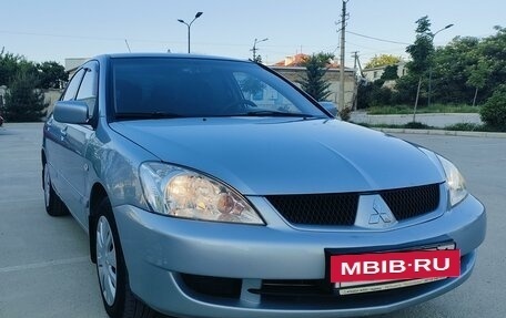 Mitsubishi Lancer IX, 2009 год, 730 000 рублей, 4 фотография