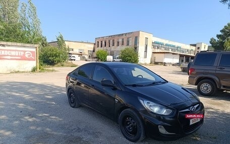 Hyundai Solaris II рестайлинг, 2011 год, 670 000 рублей, 2 фотография