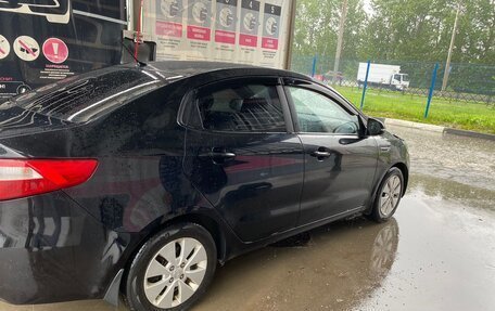 KIA Rio III рестайлинг, 2013 год, 868 000 рублей, 6 фотография