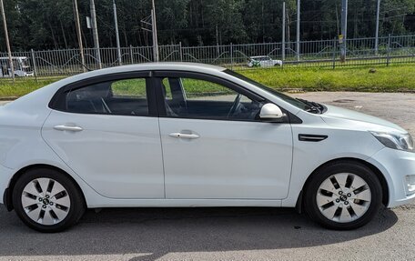 KIA Rio III рестайлинг, 2011 год, 850 000 рублей, 2 фотография