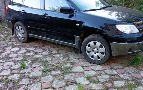 Mitsubishi Outlander III рестайлинг 3, 2007 год, 640 000 рублей, 3 фотография