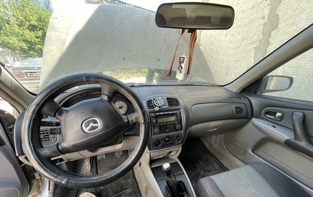 Mazda 323, 2002 год, 150 000 рублей, 4 фотография