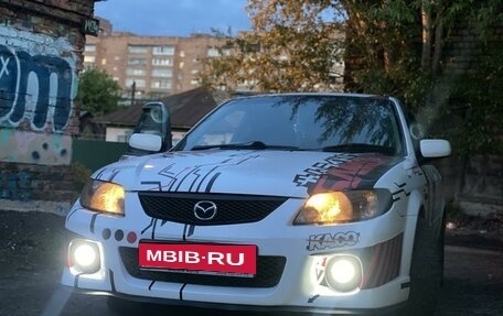 Mazda Familia, 2001 год, 395 000 рублей, 1 фотография
