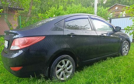 Hyundai Solaris II рестайлинг, 2011 год, 615 000 рублей, 13 фотография