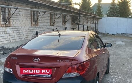 Hyundai Solaris II рестайлинг, 2011 год, 830 000 рублей, 4 фотография