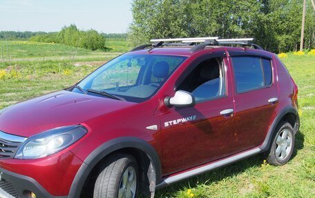 Renault Sandero I, 2012 год, 730 000 рублей, 2 фотография