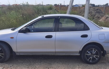 Mazda 323, 1998 год, 310 000 рублей, 4 фотография