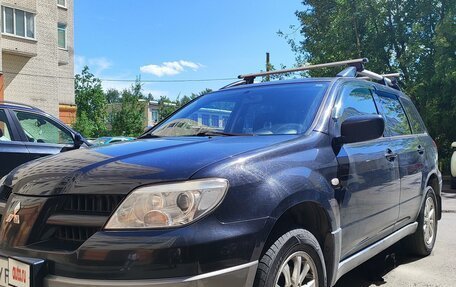 Mitsubishi Outlander III рестайлинг 3, 2008 год, 900 000 рублей, 1 фотография