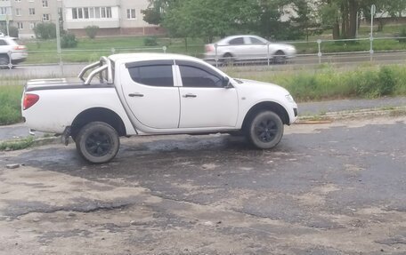 Mitsubishi L200 IV рестайлинг, 2011 год, 1 134 000 рублей, 7 фотография