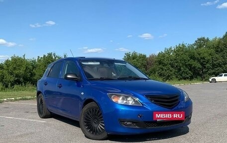 Mazda 3, 2004 год, 680 000 рублей, 3 фотография