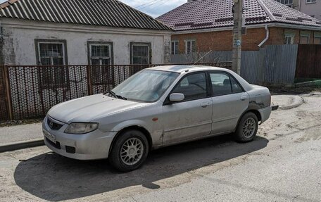 Mazda 323, 2002 год, 99 000 рублей, 1 фотография