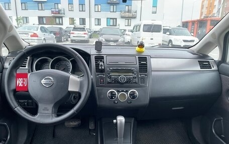 Nissan Tiida, 2010 год, 660 000 рублей, 9 фотография