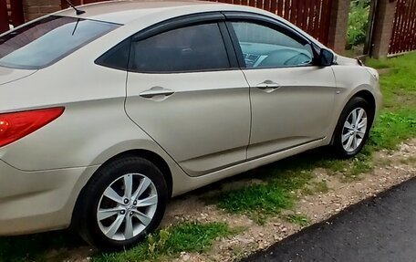 Hyundai Solaris II рестайлинг, 2011 год, 895 000 рублей, 2 фотография