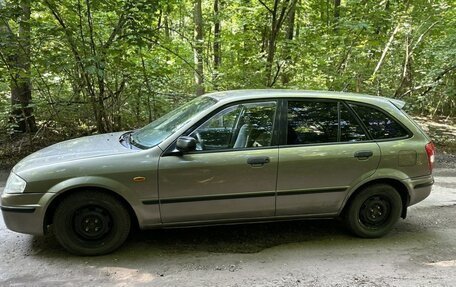 Mazda 323, 1999 год, 220 000 рублей, 8 фотография