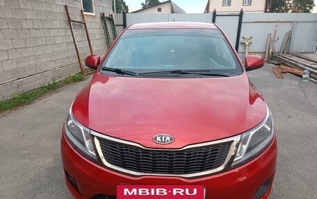 KIA Rio III рестайлинг, 2011 год, 950 000 рублей, 2 фотография