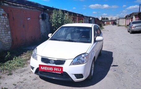 KIA Rio II, 2011 год, 650 000 рублей, 3 фотография