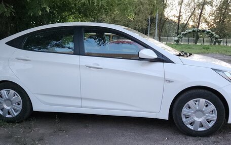 Hyundai Solaris II рестайлинг, 2011 год, 900 000 рублей, 6 фотография