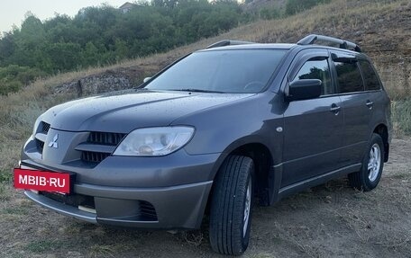 Mitsubishi Outlander III рестайлинг 3, 2008 год, 715 000 рублей, 2 фотография