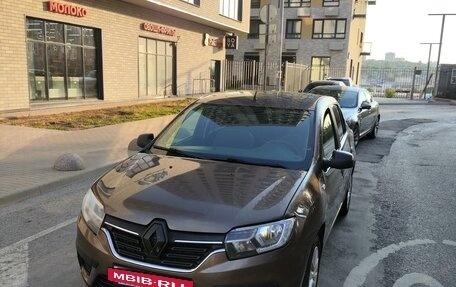 Renault Logan II, 2018 год, 700 000 рублей, 3 фотография