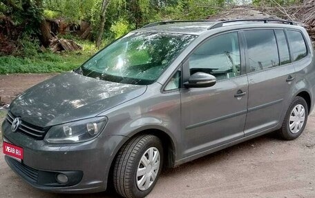 Volkswagen Touran III, 2011 год, 1 000 000 рублей, 1 фотография