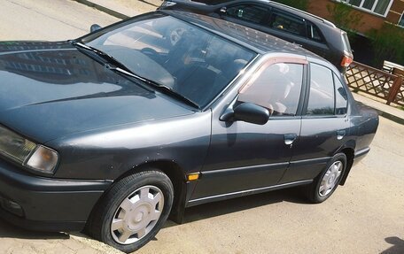 Nissan Primera II рестайлинг, 1991 год, 1 фотография