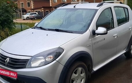 Renault Sandero I, 2013 год, 910 000 рублей, 2 фотография