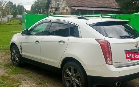 Cadillac SRX II рестайлинг, 2011 год, 1 300 000 рублей, 1 фотография