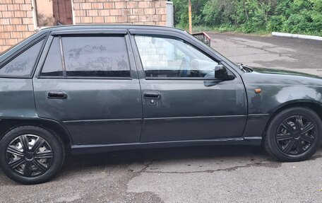 Daewoo Nexia I рестайлинг, 2004 год, 150 000 рублей, 2 фотография