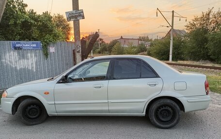 Mazda 323, 1999 год, 310 000 рублей, 2 фотография