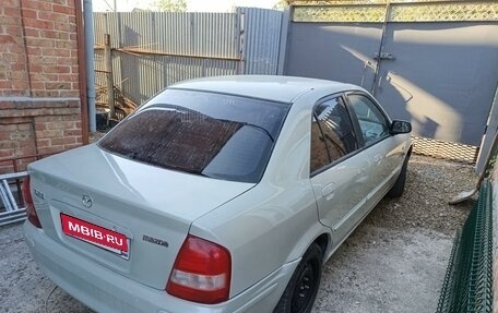 Mazda 323, 1999 год, 310 000 рублей, 4 фотография