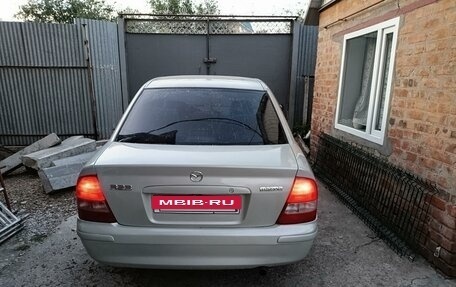 Mazda 323, 1999 год, 310 000 рублей, 5 фотография