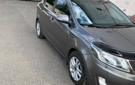 KIA Rio III рестайлинг, 2012 год, 880 000 рублей, 2 фотография