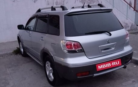 Mitsubishi Outlander III рестайлинг 3, 2006 год, 995 000 рублей, 4 фотография