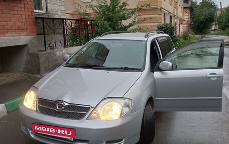 Toyota Corolla, 2003 год, 670 000 рублей, 3 фотография